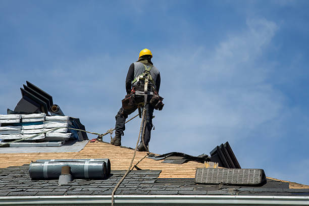 Professional Roofing technician working in Abington, MA